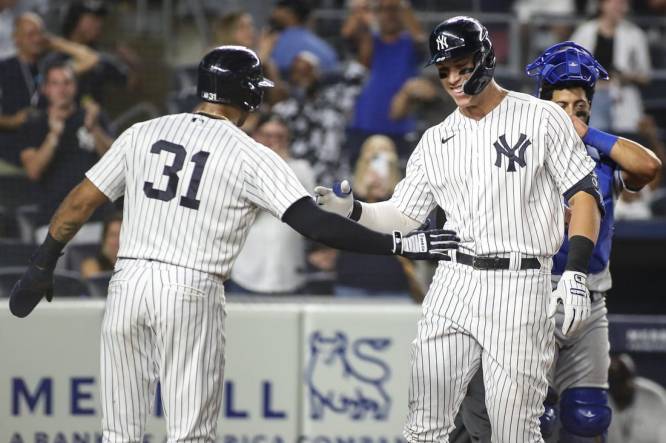 San Diego Padres shortstop Ha-Seong Kim, right, greets injured