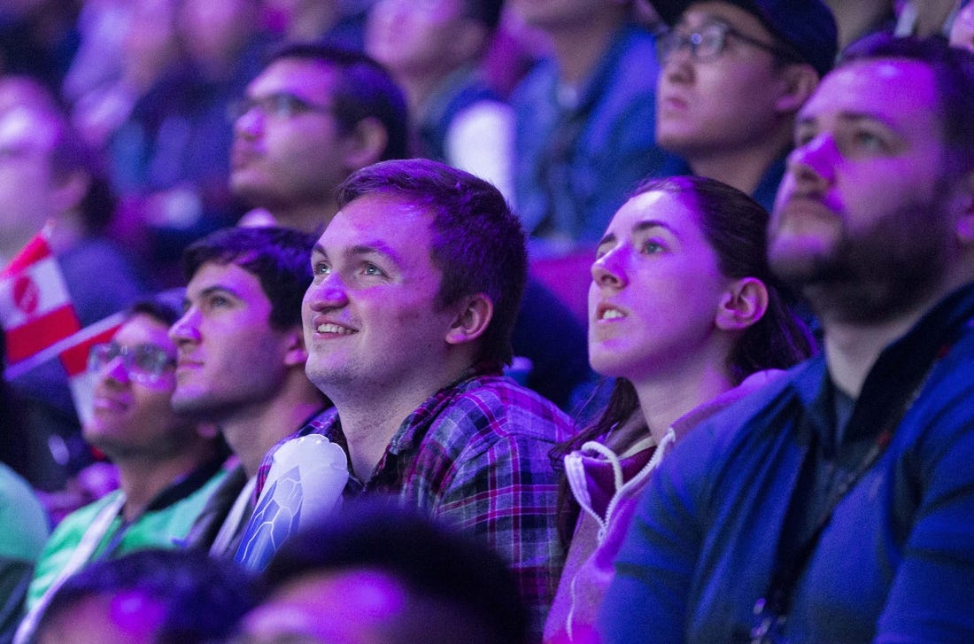 Aug 25, 2018; Vancouver, British Columbia, CAN; Fans watch as Team Evil Geniuses  plays Team LGD in the lower bracket final of the International Dota 2 Championships at Rogers Arena in Vancouver.  The championships are eSports largest annual tournament with approximately $25 million U.S. in prize money to be awarded.  Dota 2 is a free 10-player online video game with two teams of players from all over the world competing against one another in each game. Mandatory Credit: Bob Frid-USA TODAY Sports