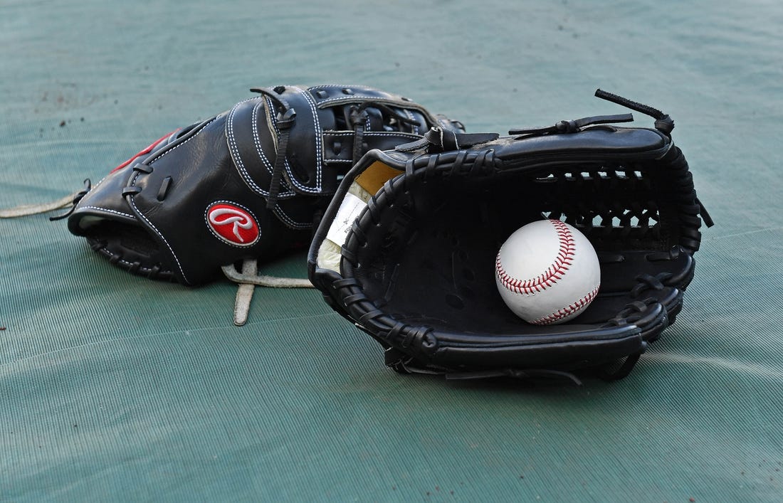 Sep 14, 2018; Kansas City, MO, USA; A general view of a baseball and glove, prior to a game between the Kansas City Royals and Minnesota Twins at Kauffman Stadium. Mandatory Credit: Peter G. Aiken/USA TODAY Sports