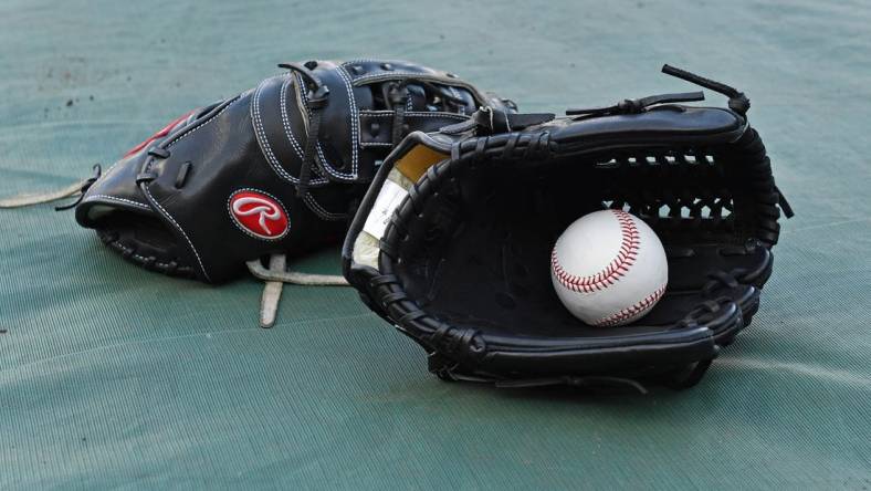 Sep 14, 2018; Kansas City, MO, USA; A general view of a baseball and glove, prior to a game between the Kansas City Royals and Minnesota Twins at Kauffman Stadium. Mandatory Credit: Peter G. Aiken/USA TODAY Sports