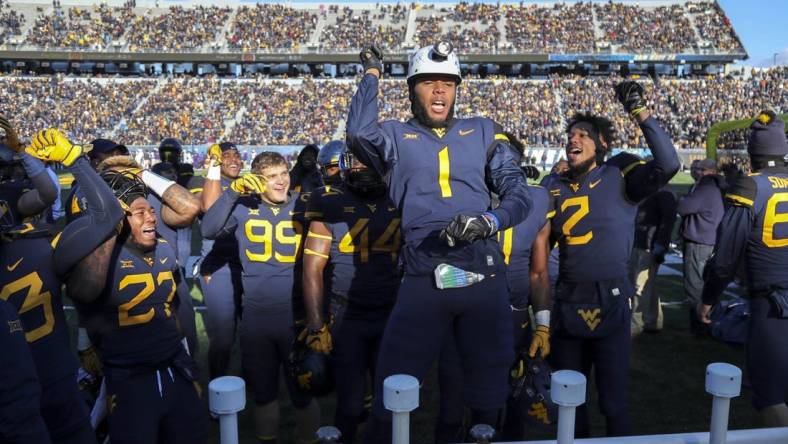 Nov 10, 2018; Morgantown, WV, USA; West Virginia Mountaineers cornerback Derrek Pitts Jr. (1) celebrates after a turnover during the fourth quarter against the TCU Horned Frogs at Mountaineer Field at Milan Puskar Stadium. Mandatory Credit: Ben Queen-USA TODAY Sports