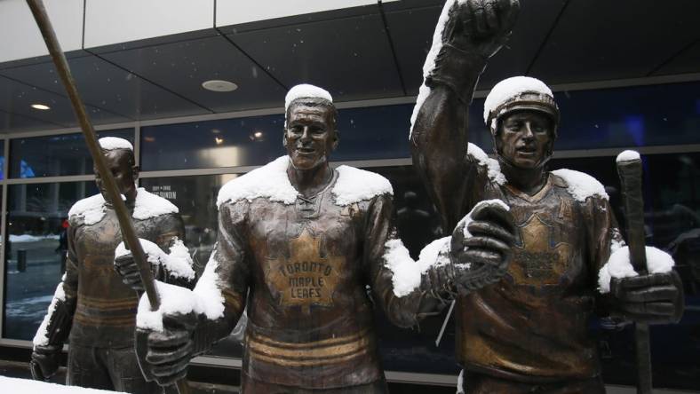 Mar 2, 2019; Toronto, Ontario, CAN; Statues of former Toronto Maple Leafs Tim Horton (center) and Borje Salming outside the front of Scotiabank Arena before a game against the Buffalo Sabres. Mandatory Credit: John E. Sokolowski-USA TODAY Sports