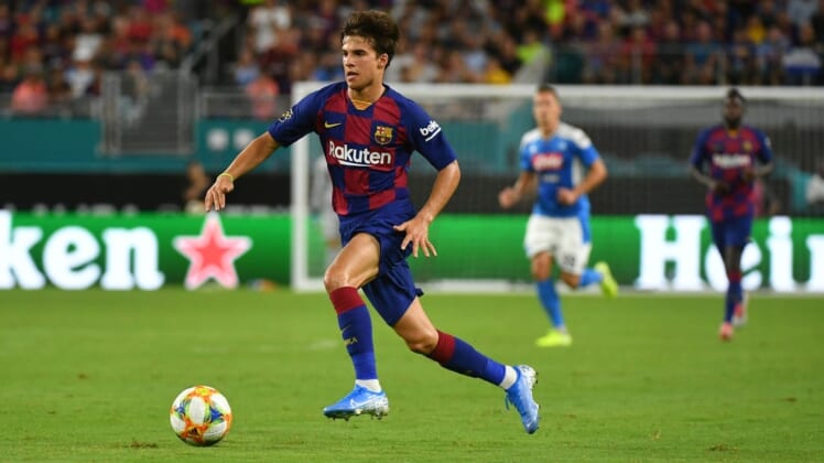 Aug 7, 2019; Miami, FL, USA; Barcelona midfielder Riqui Puig (28) during the second half of the United States La Liga-Serie A Cup Tour soccer match against Napoli at Hard Rock Stadium. Mandatory Credit: Jasen Vinlove-USA TODAY Sports