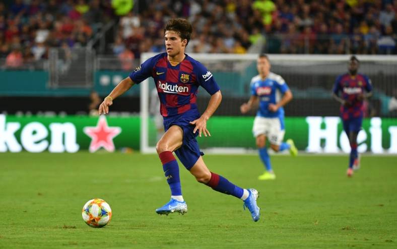 Aug 7, 2019; Miami, FL, USA; Barcelona midfielder Riqui Puig (28) during the second half of the United States La Liga-Serie A Cup Tour soccer match against Napoli at Hard Rock Stadium. Mandatory Credit: Jasen Vinlove-USA TODAY Sports