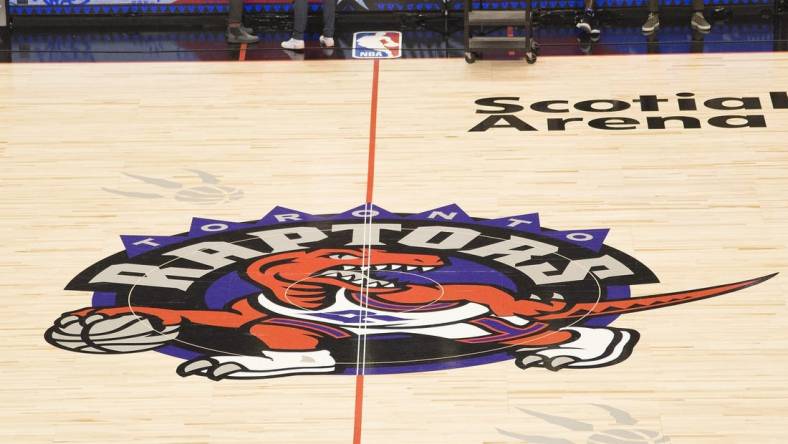 Oct 28, 2019; Toronto, Ontario, CAN; A general view of the Toronto Raptors court logo before a game against the Orlando Magic at Scotiabank Arena. Mandatory Credit: Nick Turchiaro-USA TODAY Sports