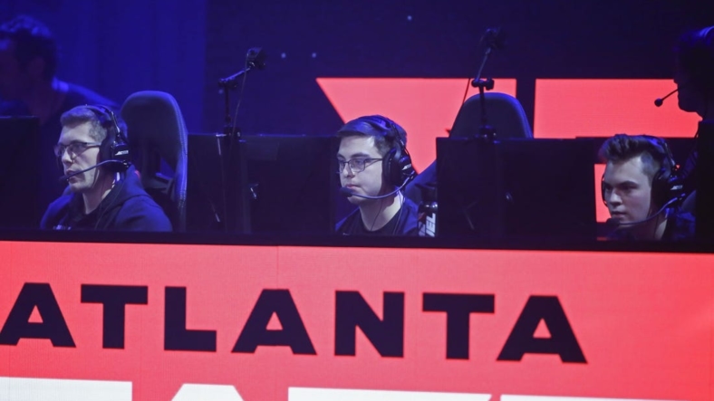 Jan 25, 2020; Minneapolis, Minnesota, USA; Michael MajorManiak Szymaniak and Chris Simp Lehr and Tyler Abezy Pharris of the Atlanta FaZe compete against the Dallas Empire during the Call of Duty League Launch Weekend at The Armory. Mandatory Credit: Bruce Kluckhohn-USA TODAY Sports