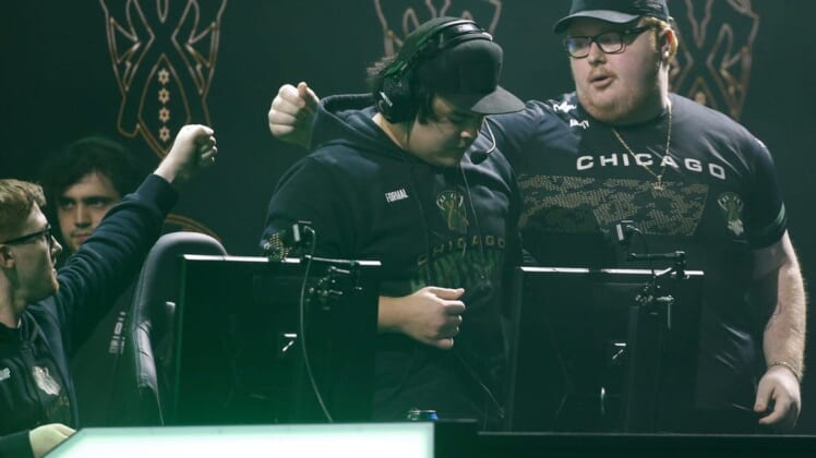 Jan 26, 2020; Minneapolis, Minnesota, USA; Seth Scump Abner and Matthew Formal Piper and Alec Arcitys Sanderson of the Chicago Huntsmen celebrate their victory over Los Angeles OpTic Gaming during the Call of Duty League Launch Weekend at The Armory. Mandatory Credit: Bruce Kluckhohn-USA TODAY Sports