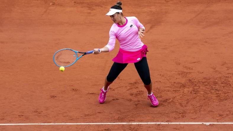 Sep 27, 2020; Paris, France; Danka Kovinic (MNE) in action during her match against Victoria Azarenka (BLR) on day one of the 2020 French Open at Stade Roland Garros. Mandatory Credit: Susan Mullane-USA TODAY Sports