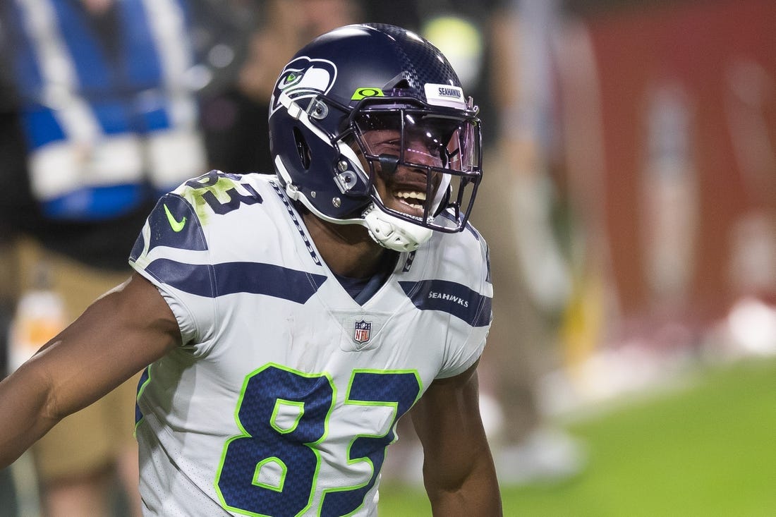 Oct 25, 2020; Glendale, Arizona, USA; Seattle Seahawks wide receiver David Moore (83) reacts following a touchdown against the Arizona Cardinals in the second quarter at State Farm Stadium. Mandatory Credit: Billy Hardiman-USA TODAY Sports