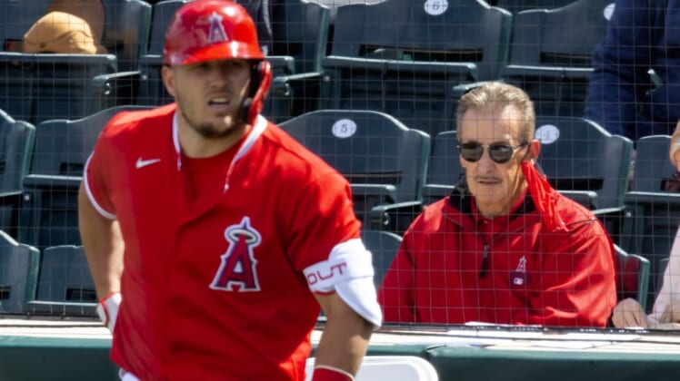 Mar 16, 2021; Tempe, Arizona, USA; Los Angeles Angels owner Arte Moreno (right) and outfielder Mike Trout against the Cleveland Indians during a Spring Training game at Tempe Diablo Stadium. Mandatory Credit: Mark J. Rebilas-USA TODAY Sports