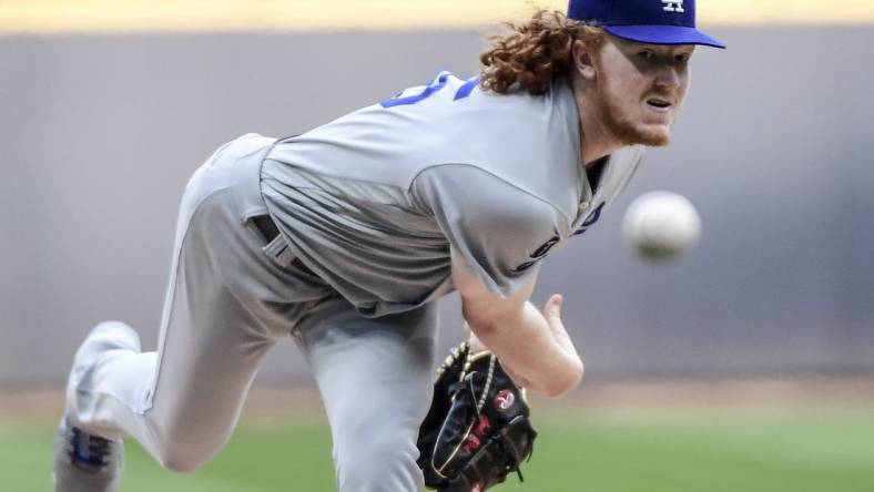 May 1, 2021; Milwaukee, Wisconsin, USA; Los Angeles Dodgers pitcher Dustin May (85) pitches in the first inning against the Milwaukee Brewers at American Family Field. Mandatory Credit: Benny Sieu-USA TODAY Sports