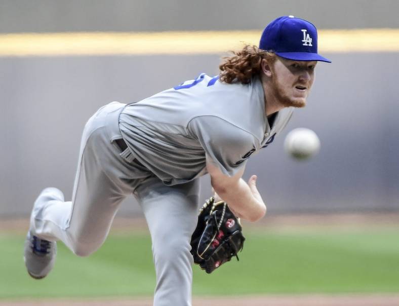 May 1, 2021; Milwaukee, Wisconsin, USA; Los Angeles Dodgers pitcher Dustin May (85) pitches in the first inning against the Milwaukee Brewers at American Family Field. Mandatory Credit: Benny Sieu-USA TODAY Sports