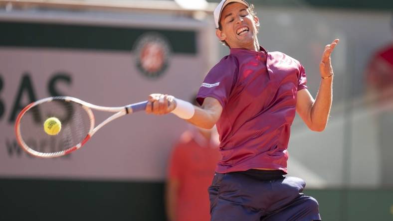 May 30, 2021; Paris, France; Dominic Thiem (AUT) in action during his match against Pablo Andujar (ESP) at Roland Garros Stadium. Mandatory Credit: Susan Mullane-USA TODAY Sports