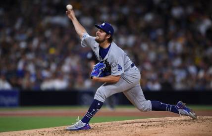 Jun 23, 2021; San Diego, California, USA; Los Angeles Dodgers starting pitcher Trevor Bauer (27) throws a pitch against the San Diego Padres during the third inning at Petco Park. Mandatory Credit: Orlando Ramirez-USA TODAY Sports