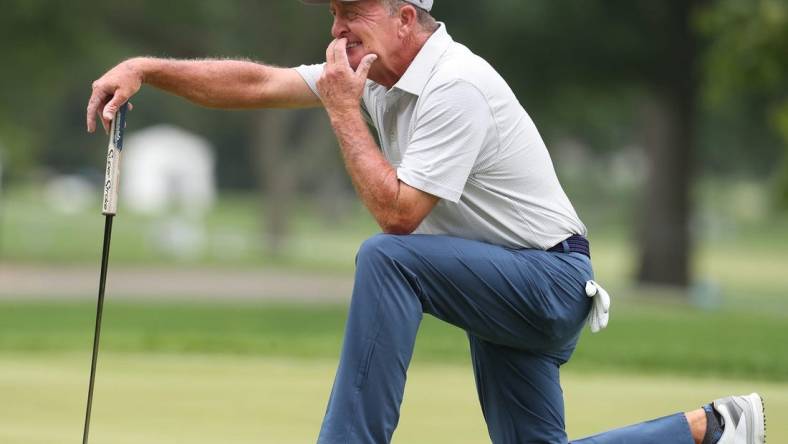 Fred Funk waits to putt on the second green during the second round of the Bridgestone Senior Players Championship at Firestone Country Club on Friday June 25, 2021 in Akron.

Bridge 626 Mc 3