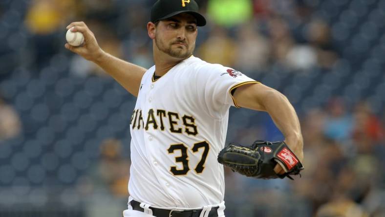 Jul 5, 2021; Pittsburgh, Pennsylvania, USA;  Pittsburgh Pirates pitcher Chase De Jong (37) delivers a pitch against the Atlanta Braves during the first inning at PNC Park. Mandatory Credit: Charles LeClaire-USA TODAY Sports