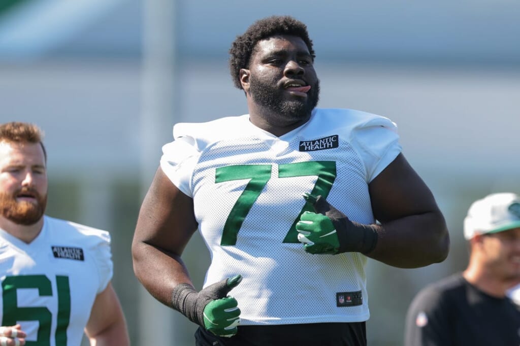 Jul 31, 2021; Florham Park, NJ, USA; New York Jets offensive tackle Mekhi Becton (77) runs during training camp at Atlantic Health Jets Training Center. Mandatory Credit: Vincent Carchietta-USA TODAY Sports