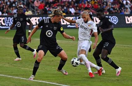 Aug 25, 2021; Los Angeles, CA, USA;   Liga MX All-Stars defender Matheus Doria (2) battles for the ball between MLS All-Stars defender Walker Zimmerman (25) and MLS All-Stars defender Yeimar Gomez (28) during the first half in the 2021 MLS All-Star Game at Banc of California Stadium.  Mandatory Credit: Jayne Kamin-Oncea-USA TODAY Sports