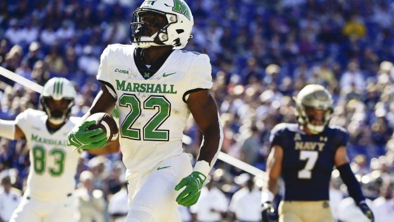 Sep 4, 2021; Annapolis, Maryland, USA;  Marshall Thundering Herd running back Rasheen Ali (22) reacts after scoring a first half touchdown against the Navy Midshipmen at Navy-Marine Corps Memorial Stadium. Mandatory Credit: Tommy Gilligan-USA TODAY Sports