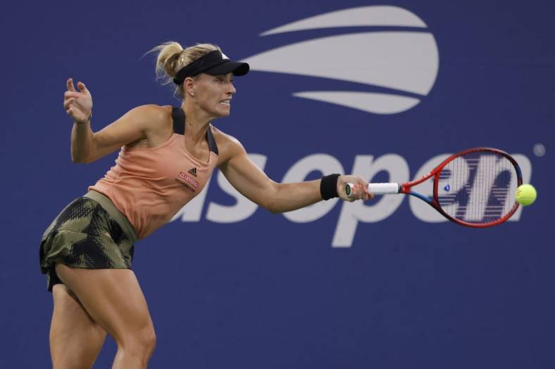 Sep 5, 2021; Flushing, NY, USA; Angelique Kerber of Germany hits a forehand against Leylah Fernandez of Canada (not pictured) on day seven of the 2021 U.S. Open tennis tournament at USTA Billie King National Tennis Center. Mandatory Credit: Geoff Burke-USA TODAY Sports