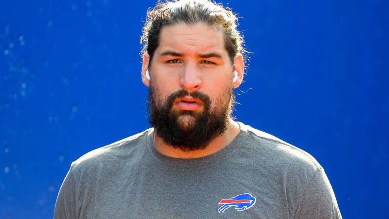 Aug 28, 2021; Orchard Park, New York, USA; Buffalo Bills offensive guard Jon Feliciano (76) walks to the field prior to the game against the Green Bay Packers at Highmark Stadium. Mandatory Credit: Rich Barnes-USA TODAY Sports