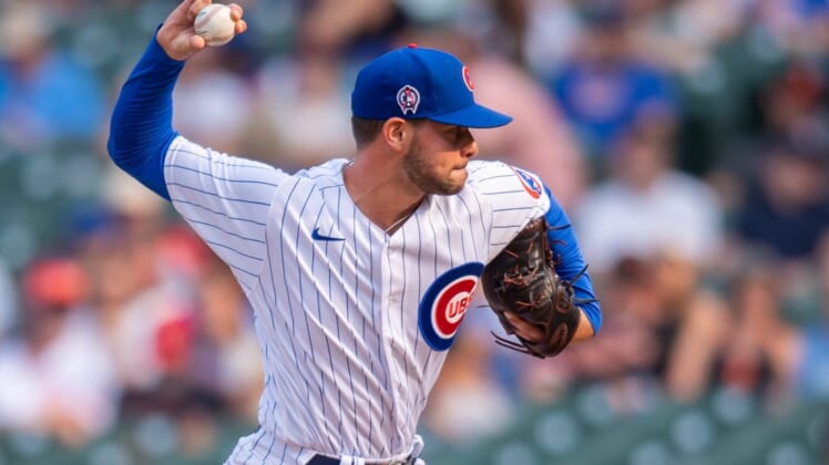 Sep 11, 2021; Chicago, Illinois, USA; Chicago Cubs relief pitcher Scott Effross (57) pitches during a game against the San Francisco Giants at Wrigley Field. Mandatory Credit: Patrick Gorski-USA TODAY Sports
