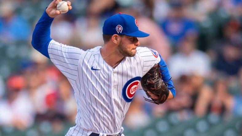 Sep 11, 2021; Chicago, Illinois, USA; Chicago Cubs relief pitcher Scott Effross (57) pitches during a game against the San Francisco Giants at Wrigley Field. Mandatory Credit: Patrick Gorski-USA TODAY Sports