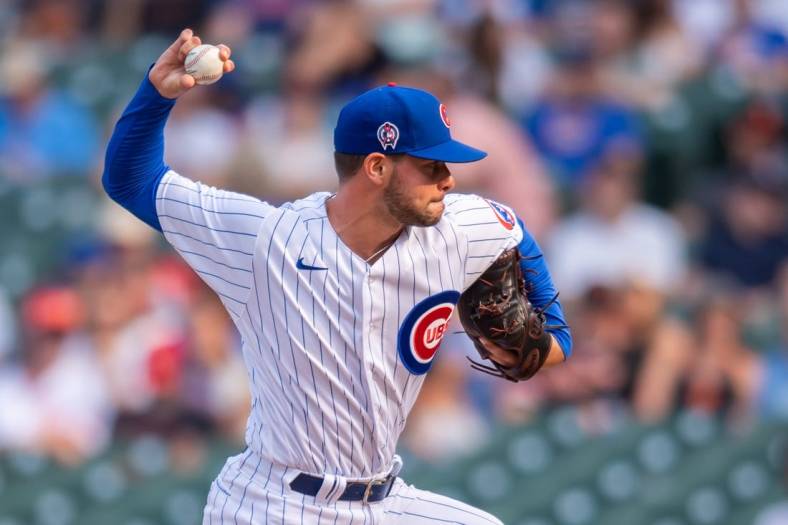 Sep 11, 2021; Chicago, Illinois, USA; Chicago Cubs relief pitcher Scott Effross (57) pitches during a game against the San Francisco Giants at Wrigley Field. Mandatory Credit: Patrick Gorski-USA TODAY Sports