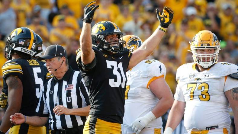 Iowa junior linebacker Jack Campbell reacts after tackling Kent State quarterback Dustin Crum in the third quarter at Kinnick Stadium in Iowa City on Saturday, Sept. 18, 2021.

20210918 Iowavskentstate