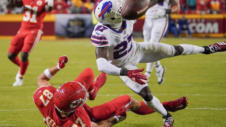 Oct 10, 2021; Kansas City, Missouri, USA; Buffalo Bills cornerback Tre'Davious White (27) breaks up a pass intended for Kansas City Chiefs tight end Travis Kelce (87) during the second half at GEHA Field at Arrowhead Stadium. Mandatory Credit: Denny Medley-USA TODAY Sports