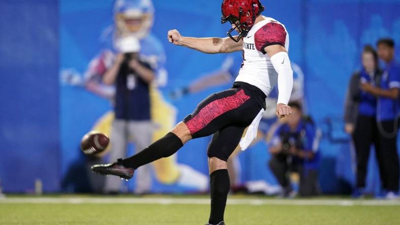 Oct 15, 2021; San Jose, California, USA; San Diego State Aztecs kicker Matt Araiza (2) punts during the fourth quarter against the San Jose State Spartans at CEFCU Stadium. Mandatory Credit: Darren Yamashita-USA TODAY Sports