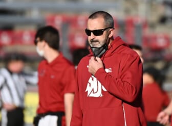 Oct 16, 2021; Pullman, Washington, USA; Washington State Cougars head coach Nick Rolovich looks on during warms before a game against the Stanford Cardinal at Gesa Field at Martin Stadium. Mandatory Credit: James Snook-USA TODAY Sports