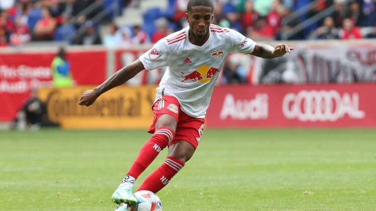 Oct 17, 2021; Harrison, New Jersey, USA; New York Red Bulls defender Kyle Duncan (6) moves the ball during the firs half against New York City FC at Red Bull Arena. Mandatory Credit: Tom Horak-USA TODAY Sports