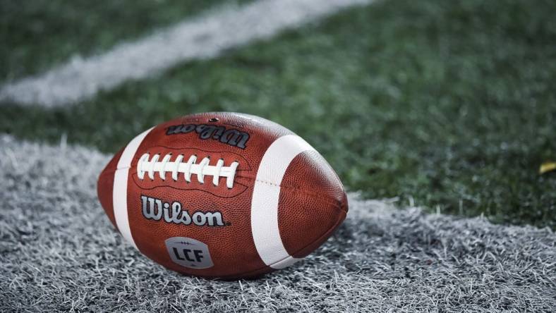 Oct 22, 2021; Montreal, Quebec, CAN; view of a CFL game ball with a french logo on the field before the first quarter during a Canadian Football League game at Molson Stadium. Mandatory Credit: David Kirouac-USA TODAY Sports