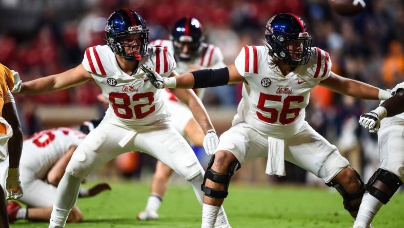 Oct 16, 2021; Knoxville, Tennessee, USA; Mississippi Rebels tight end Luke Knox (82) and offensive lineman Reece McIntyre (56) blocking during the second half against the Tennessee Volunteers at Neyland Stadium. Mandatory Credit: Bryan Lynn-USA TODAY Sports