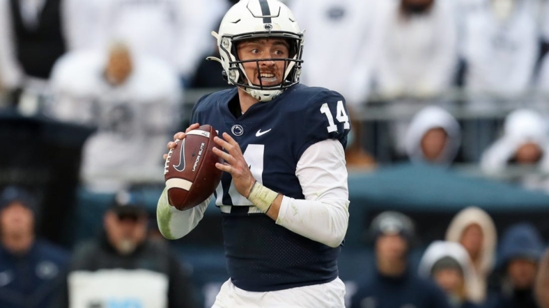 Nov 13, 2021; University Park, Pennsylvania, USA; Penn State Nittany Lions quarterback Sean Clifford (14) looks to throw a pass during the fourth quarter against the Michigan Wolverines at Beaver Stadium. Michigan defeated Penn State 21-17. Mandatory Credit: Matthew OHaren-USA TODAY Sports