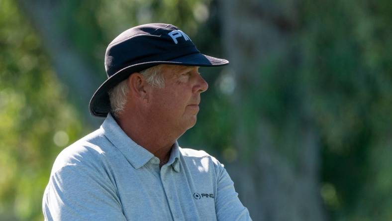 Nov 14, 2021; Phoenix, Arizona, USA; Kirk Triplett stands aside the tee of the seventh and awaits his turn to play during the final round of the Charles Schwab Cup Championship golf tournament at Phoenix Country Club. Mandatory Credit: Allan Henry-USA TODAY Sports