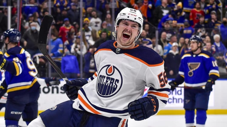 Nov 14, 2021; St. Louis, Missouri, USA;  Edmonton Oilers right wing Kailer Yamamoto (56) reacts after scoring the game winning goal against the St. Louis Blues during the third period at Enterprise Center. Mandatory Credit: Jeff Curry-USA TODAY Sports