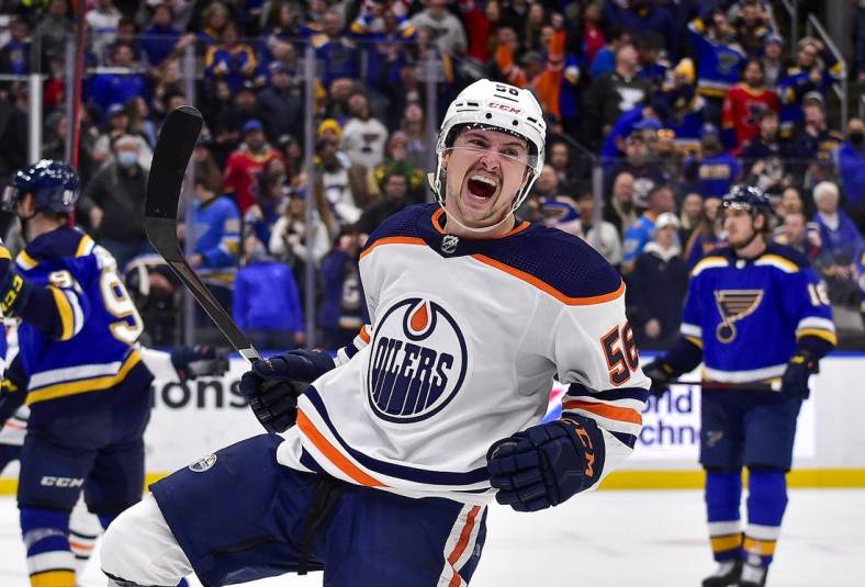 Nov 14, 2021; St. Louis, Missouri, USA;  Edmonton Oilers right wing Kailer Yamamoto (56) reacts after scoring the game winning goal against the St. Louis Blues during the third period at Enterprise Center. Mandatory Credit: Jeff Curry-USA TODAY Sports