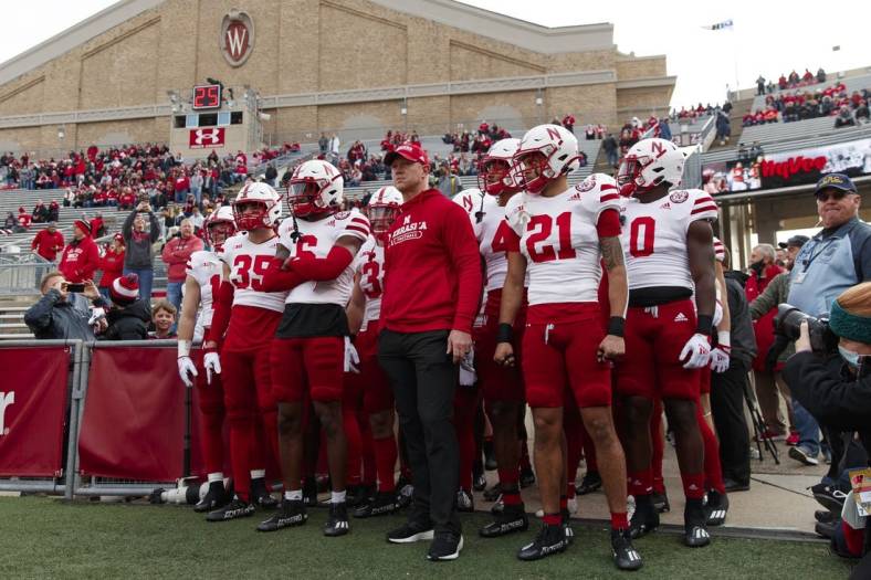 Nov 20, 2021; Madison, Wisconsin, USA;  Nebraska Cornhuskers head coach Scott Frost waits with the football team before taking to the field prior to the game against the Wisconsin Badgers at Camp Randall Stadium. Mandatory Credit: Jeff Hanisch-USA TODAY Sports