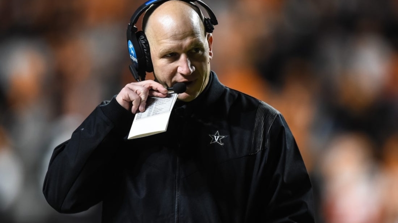 Nov 27, 2021; Knoxville, Tennessee, USA; Vanderbilt Commodores head coach Clark Lea coaches during the second half against the Tennessee Volunteers at Neyland Stadium. Mandatory Credit: Bryan Lynn-USA TODAY Sports