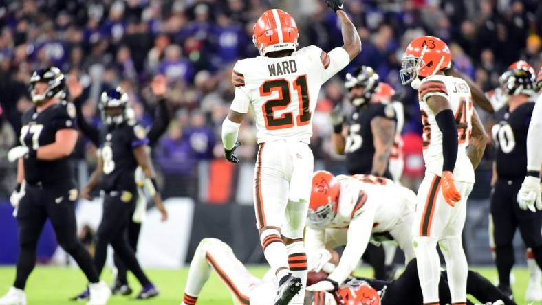 Nov 28, 2021; Baltimore, Maryland, USA; Cleveland Browns cornerback Denzel Ward (21) reacts after an interception in the second quarter against the Baltimore Ravens at M&T Bank Stadium. Mandatory Credit: Evan Habeeb-USA TODAY Sports