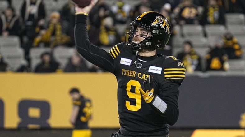 Dec 12, 2021; Hamilton, Ontario, CAN; Hamilton Tiger-Cats quarterback Dane Evans (9) throws a pass during warmup for the 108th Grey Cup football game against Winnipeg Blue Bombers at Tim Hortons Field. Mandatory Credit: John E. Sokolowski-USA TODAY Sports