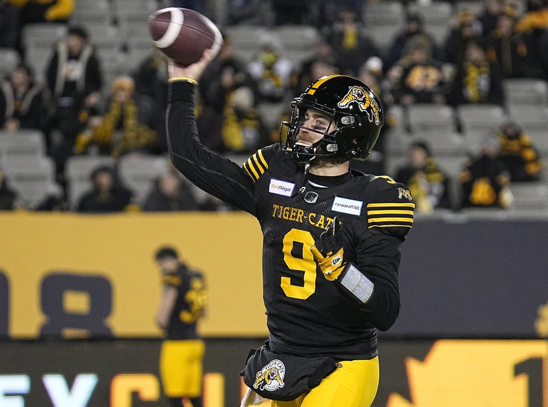 Dec 12, 2021; Hamilton, Ontario, CAN; Hamilton Tiger-Cats quarterback Dane Evans (9) throws a pass during warmup for the 108th Grey Cup football game against Winnipeg Blue Bombers at Tim Hortons Field. Mandatory Credit: John E. Sokolowski-USA TODAY Sports