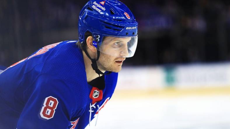 Dec 12, 2021; New York, New York, USA; New York Rangers defenseman Jacob Trouba (8) awaits a face-off against the Nashville Predators during the third period at Madison Square Garden. Mandatory Credit: Danny Wild-USA TODAY Sports