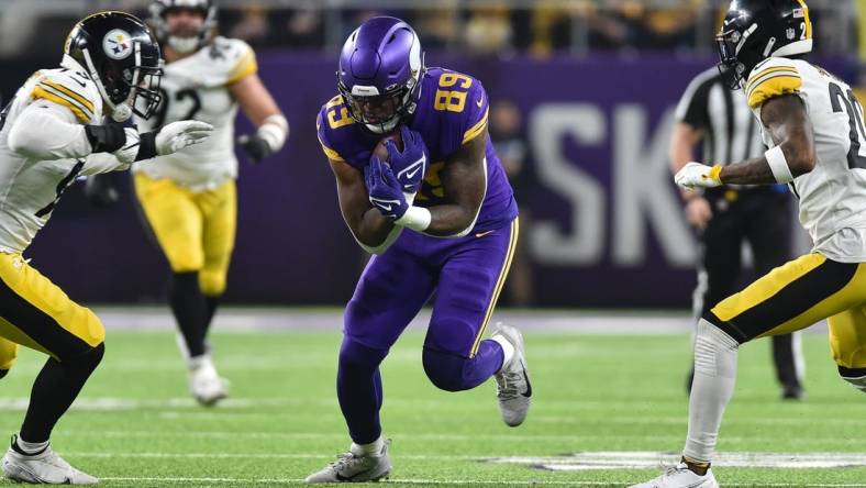 Dec 9, 2021; Minneapolis, Minnesota, USA; Minnesota Vikings tight end Chris Herndon (89) and Pittsburgh Steelers inside linebacker Joe Schobert (93) and cornerback Cameron Sutton (20) in action at U.S. Bank Stadium. Mandatory Credit: Jeffrey Becker-USA TODAY Sports