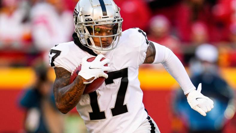 Dec 12, 2021; Kansas City, Missouri, USA; Las Vegas Raiders wide receiver Willie Snead (17) returns a kickoff against the Kansas City Chiefs during the second half at GEHA Field at Arrowhead Stadium. Mandatory Credit: Jay Biggerstaff-USA TODAY Sports