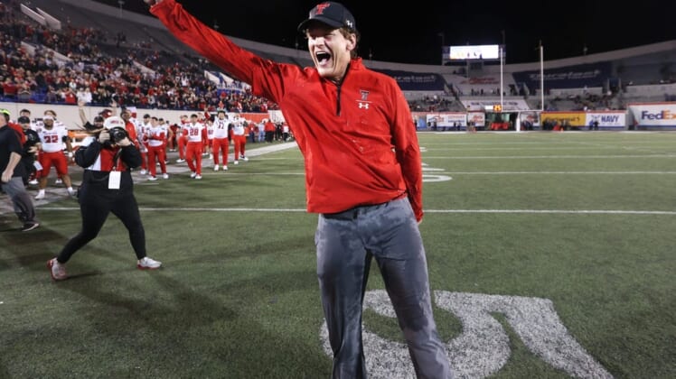 Louisiana Tech coach Sonny Cumbie (file photo) celebrates at Texas Tech in a 34-7 win over the Mississippi State Bulldogs at the AutoZone Liberty Bowl at Liberty Bowl Memorial Stadium on Tuesday, Dec. 28, 2021.Jrca7082