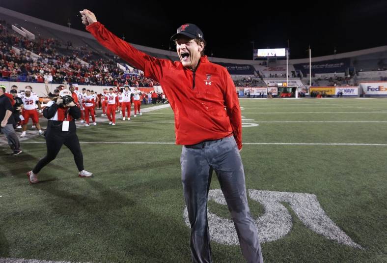 Louisiana Tech coach Sonny Cumbie (file photo) celebrates at Texas Tech in a 34-7 win over the Mississippi State Bulldogs at the AutoZone Liberty Bowl at Liberty Bowl Memorial Stadium on Tuesday, Dec. 28, 2021.

Jrca7082