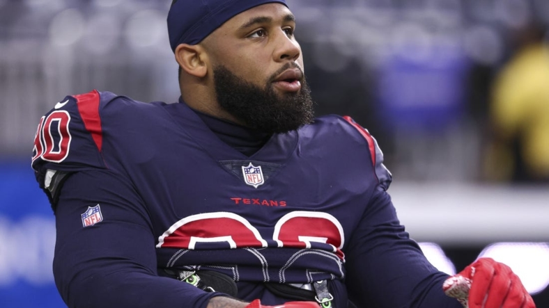 Dec 26, 2021; Houston, Texas, USA; Houston Texans defensive tackle Ross Blacklock (90) warms up before the game against the Los Angeles Chargers at NRG Stadium. Mandatory Credit: Troy Taormina-USA TODAY Sports